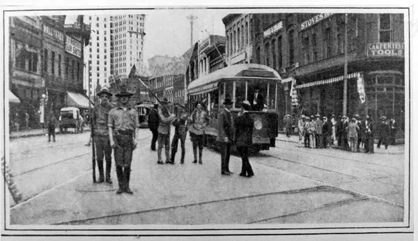 Harper's Weekly image of militia and a streetcar at Walton and Peachtree Streets.