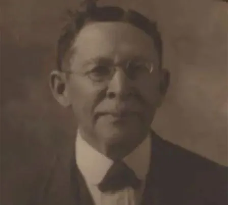 Luther Judson Price, Atlanta's first Black postmaster, in a period portrait with spectacles and a bow tie.