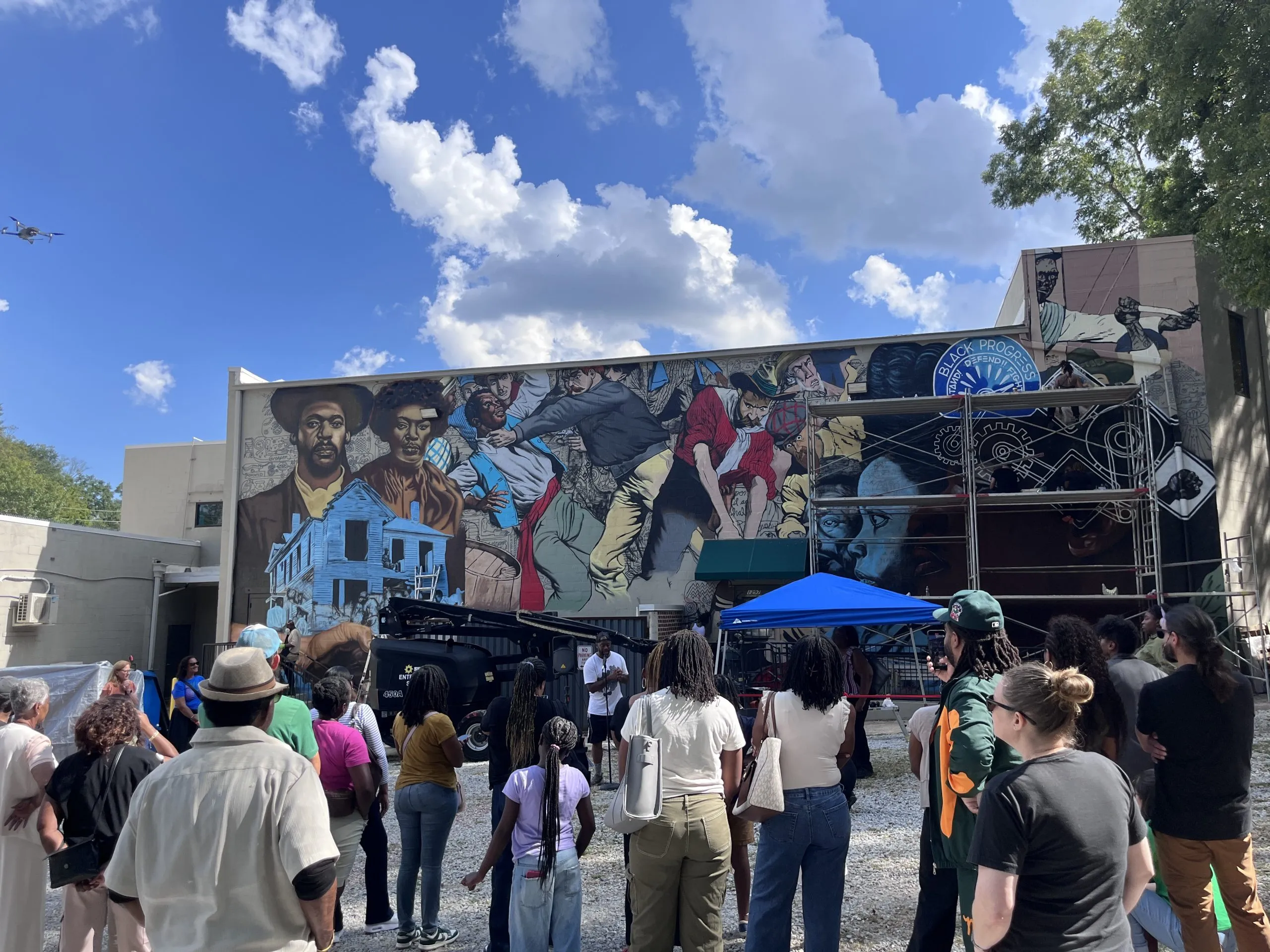 Crowd gathered at the dedication of Fabian Williams's 1906 mural in Brownsville.